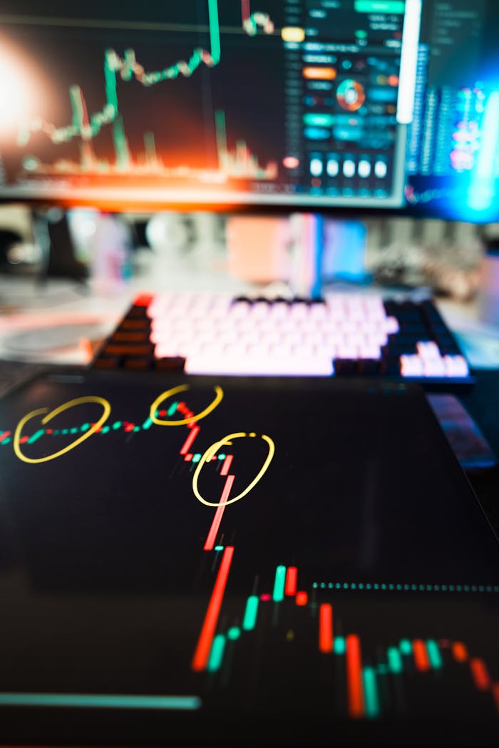 services-03 Close-up of cryptocurrency market data visualization on screens with highlighted trends and charts.